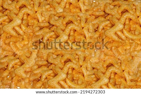 Fried and Spicy ABCD, Alphabet Snacks or Fryums (Snacks Pellets) food background, selective focus - Image