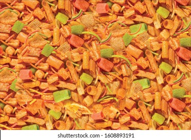 Fried and Spicy mix frymus, cocktail (Khichadi) Colourful, Square, cup, ABCD, pasta, Noodles, triangle, wheel and pipe shape Fryums Papad or fingers is a crunchy Snack Pellets - Image
