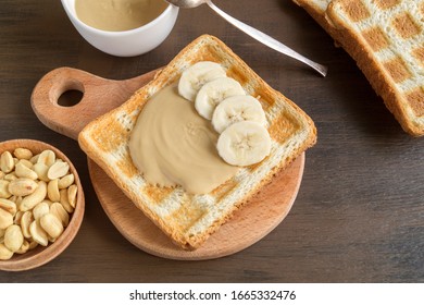 Fried toast with peanut butter and berries. - Shutterstock ID 1665332476