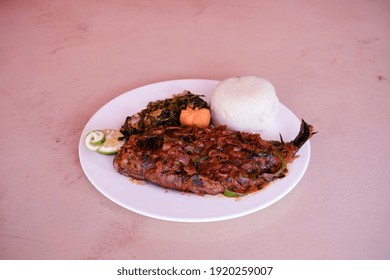 Fried Whole Tilapia Fish Served With Creamed Ugali And Managu