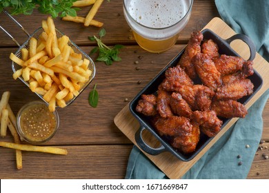 fried wings with beer and French fries