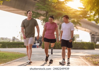 Friend support Friend with a  exercising outdoor. People walking together on park outdoor. Exercise walking  woman and friend support together in park outdoor - Powered by Shutterstock