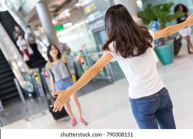 Friend Welcome Back By Embracing Airport. Hall International Missing Hug And Greeting At Arrival Gate 