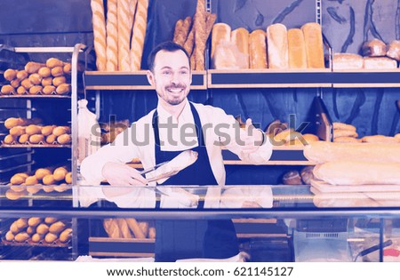 Similar – Image, Stock Photo African man works in pastry shop.