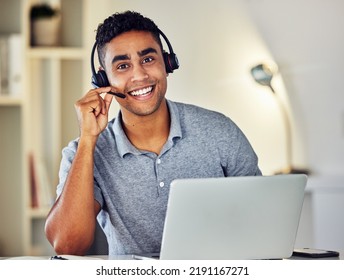 . Friendly Call Center, Online Or Tech Support Worker Who Helps Clients, Customers And Callers. Man On A Laptop, With A Headset And Working As A Customer Service Professional From Home Portrait.