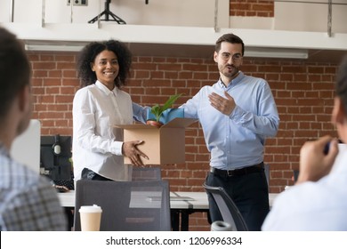 Friendly company ceo welcoming female african american employee introducing hired worker in multiracial office getting acquainted supporting new team member on first work day, introduction concept