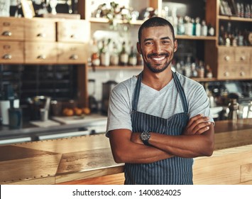 Friendly confident male owner at his cafe - Powered by Shutterstock