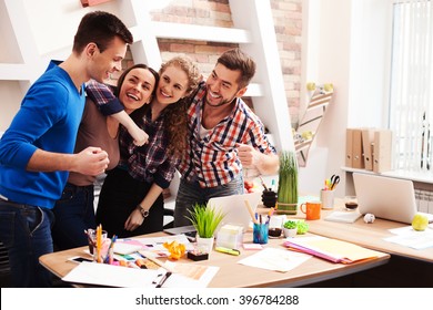 Friendly creative team is expressing positive emotions