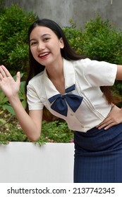 Friendly Cute Filipina Sorority Girl Wearing Skirt Standing