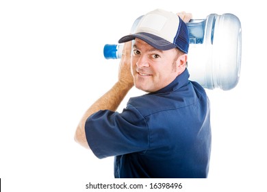 Friendly Delivery Man Carrying A Five Gallon Jug Of Drinking Water Over His Shoulder.  Isolated On White.