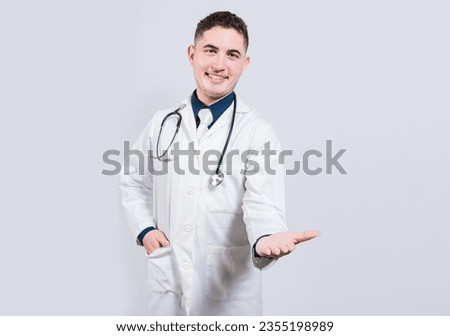 Friendly doctor extending hand in welcome isolated. Happy doctor extending hand to camera. Cheerful doctor extending hand welcome
