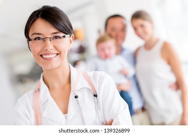 Friendly family doctor at the hospital looking happy