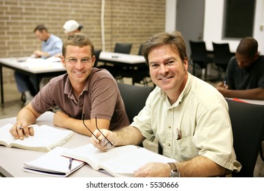 Friendly, Happy Adult Education Students Sitting In Class.