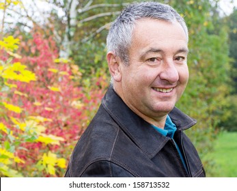 Friendly men portrait in autumn - Powered by Shutterstock