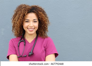Friendly nurse with stethoscope isolated on blue background