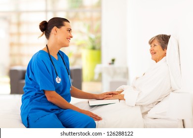 friendly nurse visiting recovering senior patient - Powered by Shutterstock