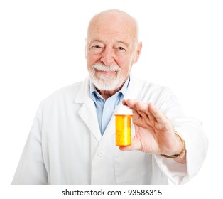 Friendly Pharmacist Holding A Bottle Of Pills.  Isolated On White.