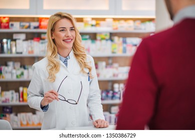Friendly Pharmacist Serving Customer Stock Photo 1350386729 | Shutterstock