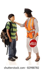 A Friendly School Crossing Guard Interacting With A Preteen Student.  Isolated.