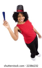 A Friendly Woman Celebrates New Years Eve By Wearing Festive Hats And Holding A Noise Maker