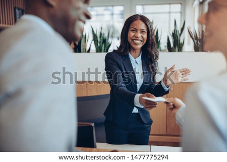 Similar – Image, Stock Photo Young woman in hotel corridor