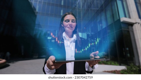 Friendly young businesswoman using digital computer tablet near office building. Bar graph with auto trading computer coding artificial intelligence technology, AI. 3d Animation. - Powered by Shutterstock