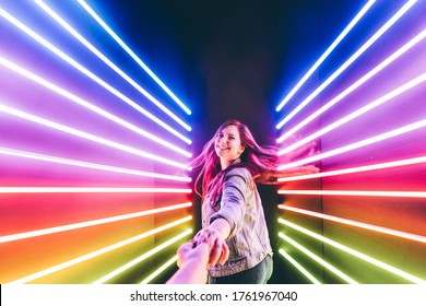 Friendly Young People Laughing And Having Fun On Neon Background.