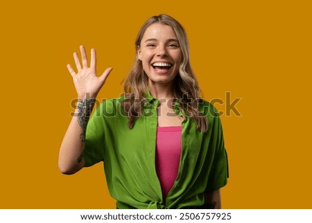 Similar – Pretty woman with OKAY sign, ok gesture. Happy lady, correct choice, yellow wall