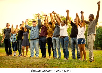 Friends Of All Ages Holding Hands