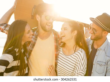 Friends  at the beach having fun together  - Shutterstock ID 304262531