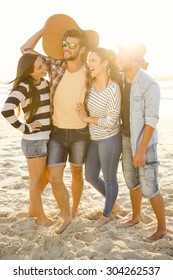 Friends  At The Beach Having Fun Together 