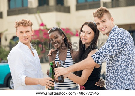 Similar – Group of young people having fun in summer party