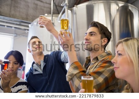 Friends beer tasting at brewery
