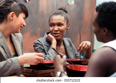 Friends, Black And Latin People, Eating Ramen Noodle Soup In Japanese Restaurant