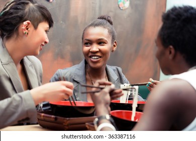 Friends, Black And Latin People, Eating Ramen Noodle Soup In Japanese Restaurant