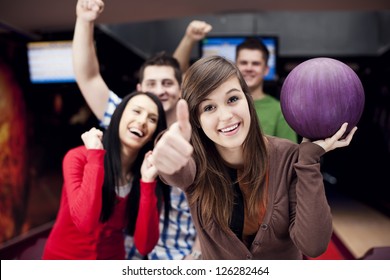 Friends Bowling Together