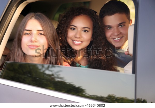Friends in a\
car