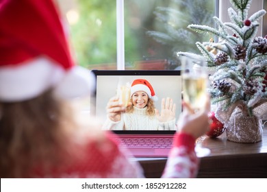 Friends Celebrating Christmas Holiday Online By Video Chat In Quarantine. Lockdown Stay Home Concept. Xmas Party During Pandemic Coronavirus COVID 19