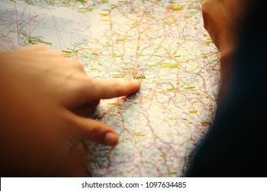 Friends Checking Where To Go On A Map