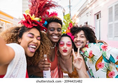 Friends in costumes have fun at carnival party in the street. Brazil holiday fun selfie with group of people together - Shutterstock ID 2094431482