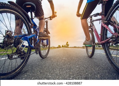 Friends Cycling Together