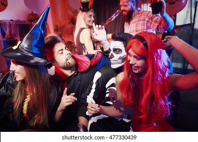 Friends Dancing At Halloween Party