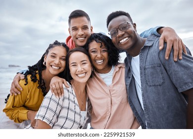 Friends, diversity and portrait at beach, ocean and outdoor nature for fun, happiness and travel. Group of happy young people at sea for holiday, vacation and smile for relaxing weekend trip together - Powered by Shutterstock