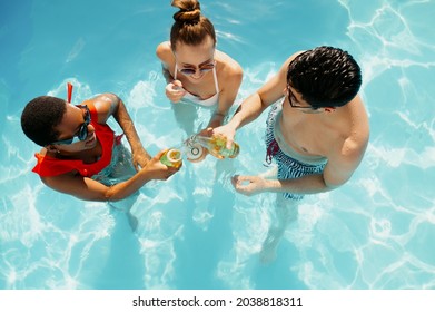 Friends Drink Beverages In The Pool, Top View