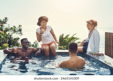 Friends, drinks and happy at party in swimming pool with memory, funny chat and blue sky in summer. Men, women and people in group in water, relax and comic conversation with alcohol at social event - Powered by Shutterstock