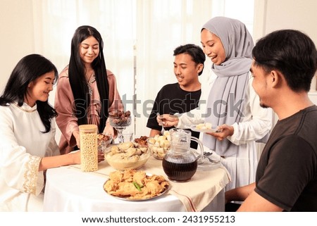 Friends Eat Dinner at Ramadhan Holy Month for Breaking the Fast, Buka Bersama or Bukber Concept 