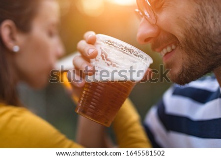 Similar – Image, Stock Photo Glass of beer at sunset at Steinhuder Meer