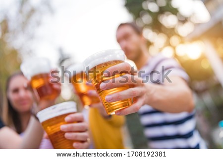 Similar – Image, Stock Photo Glass of beer at sunset at Steinhuder Meer