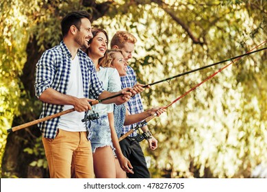 Friends enjoying nature and fishing. - Powered by Shutterstock