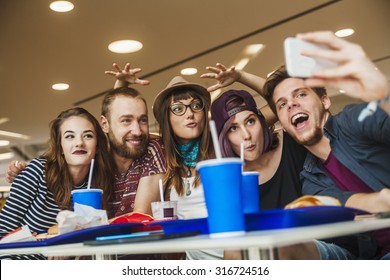 Friends Enjoying And Taking Selfie At The Mall